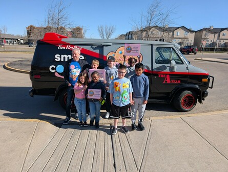 Students receiving Tim Horton's Smile Cookies from the Sargent Family Foundation